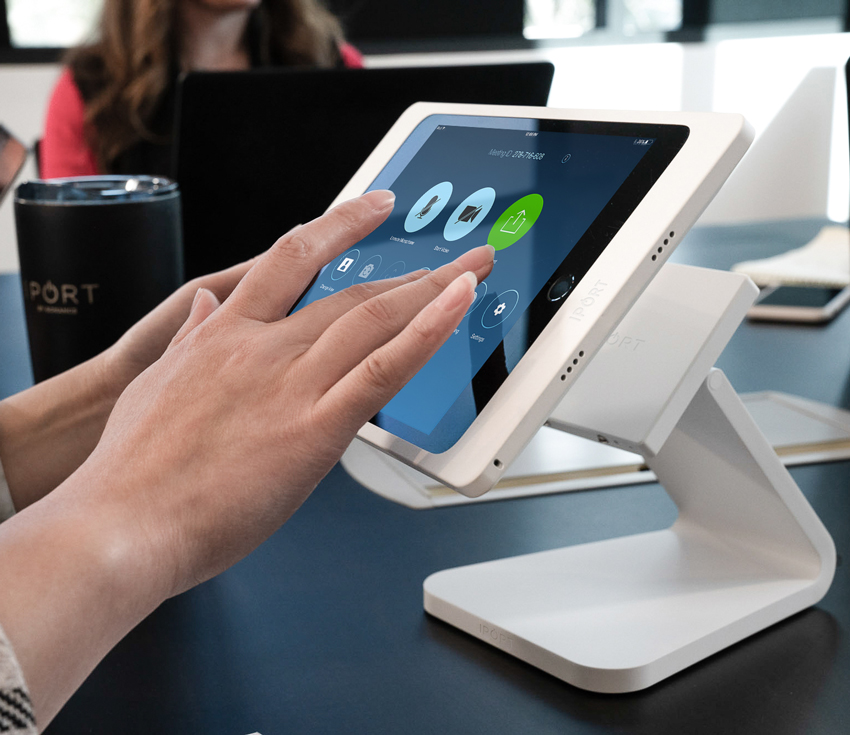 White iPad case for business by IPORT used in a corporate office as a meeting room console for iPad.